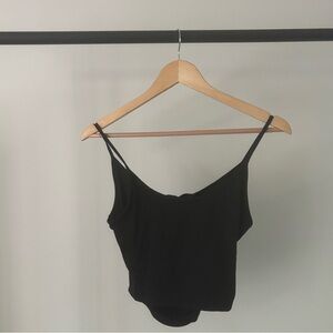 Athleta, women’s size small black twist back crop tank.